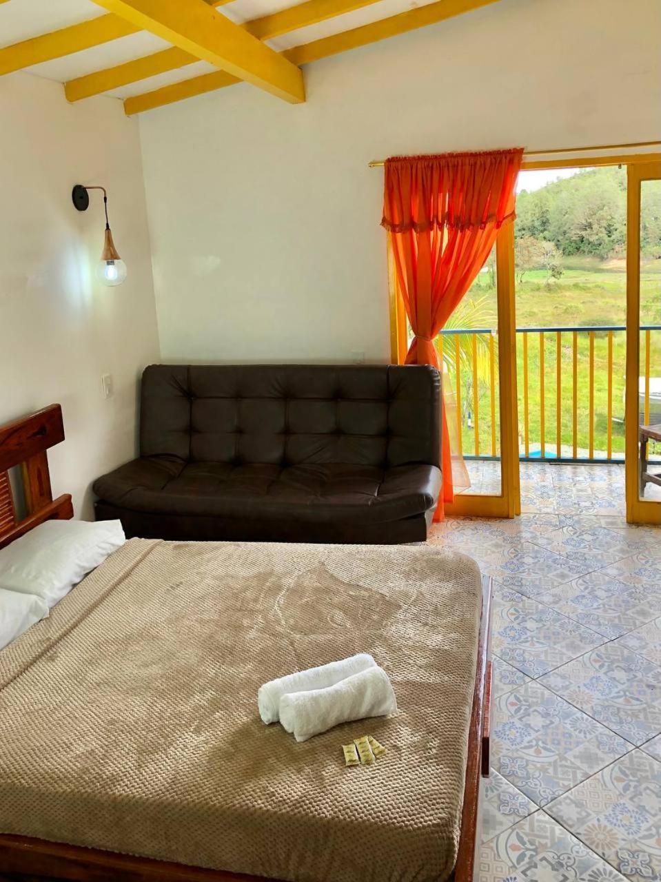 Alegria Hostel Boutique Гуатапе Номер фото